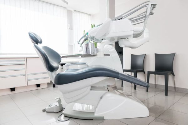 Horizontal color image of dental office with equipment.